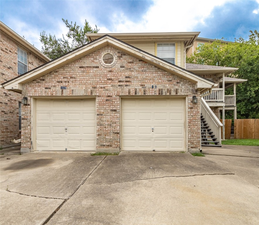 a front view of a house with a garage