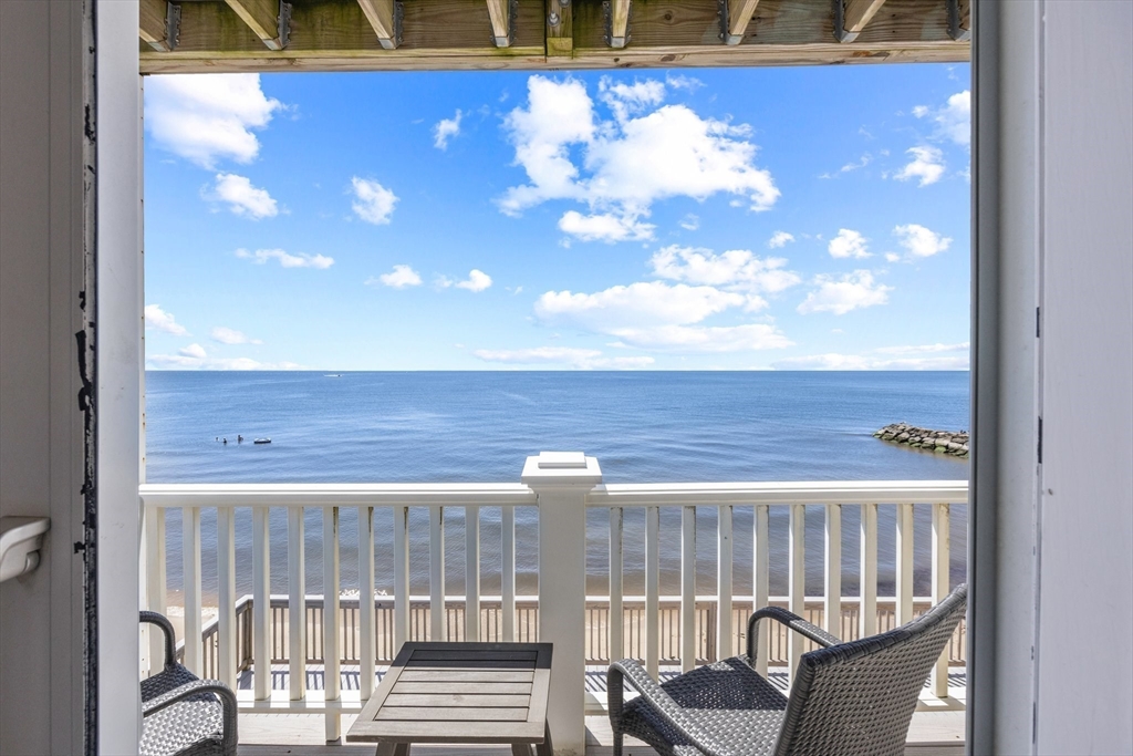 a view of a balcony with chair