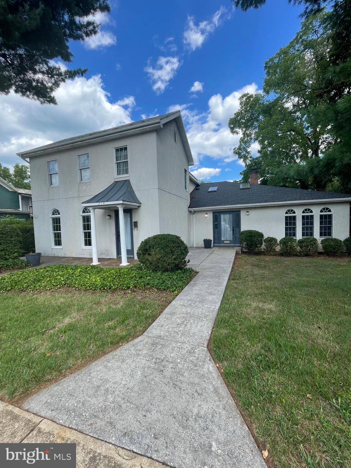 front view of a house and a yard