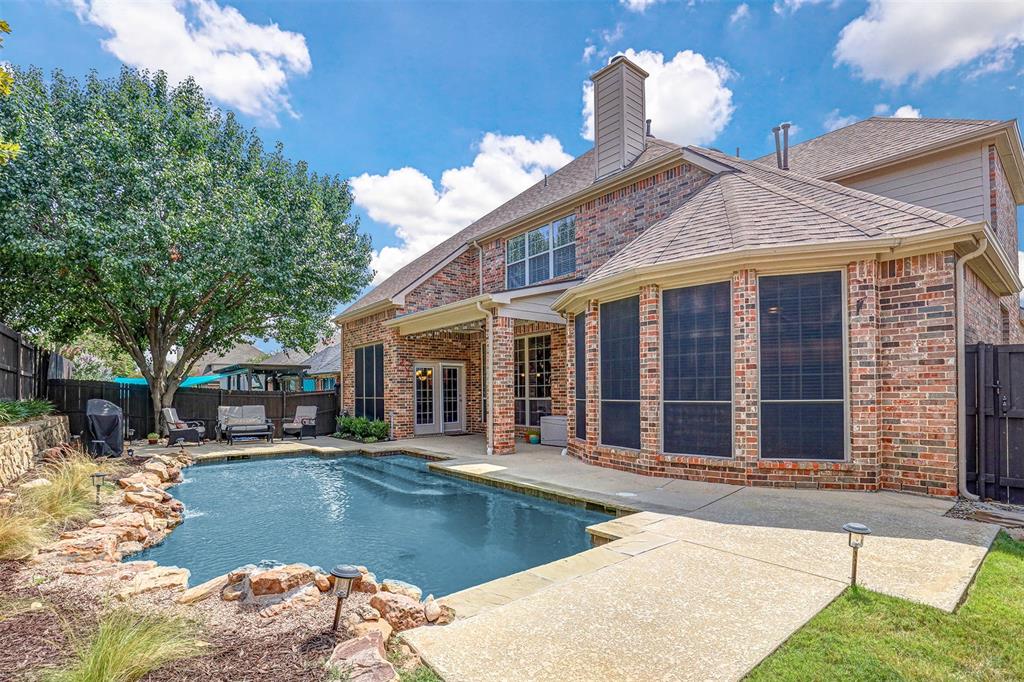 a view of a house with swimming pool