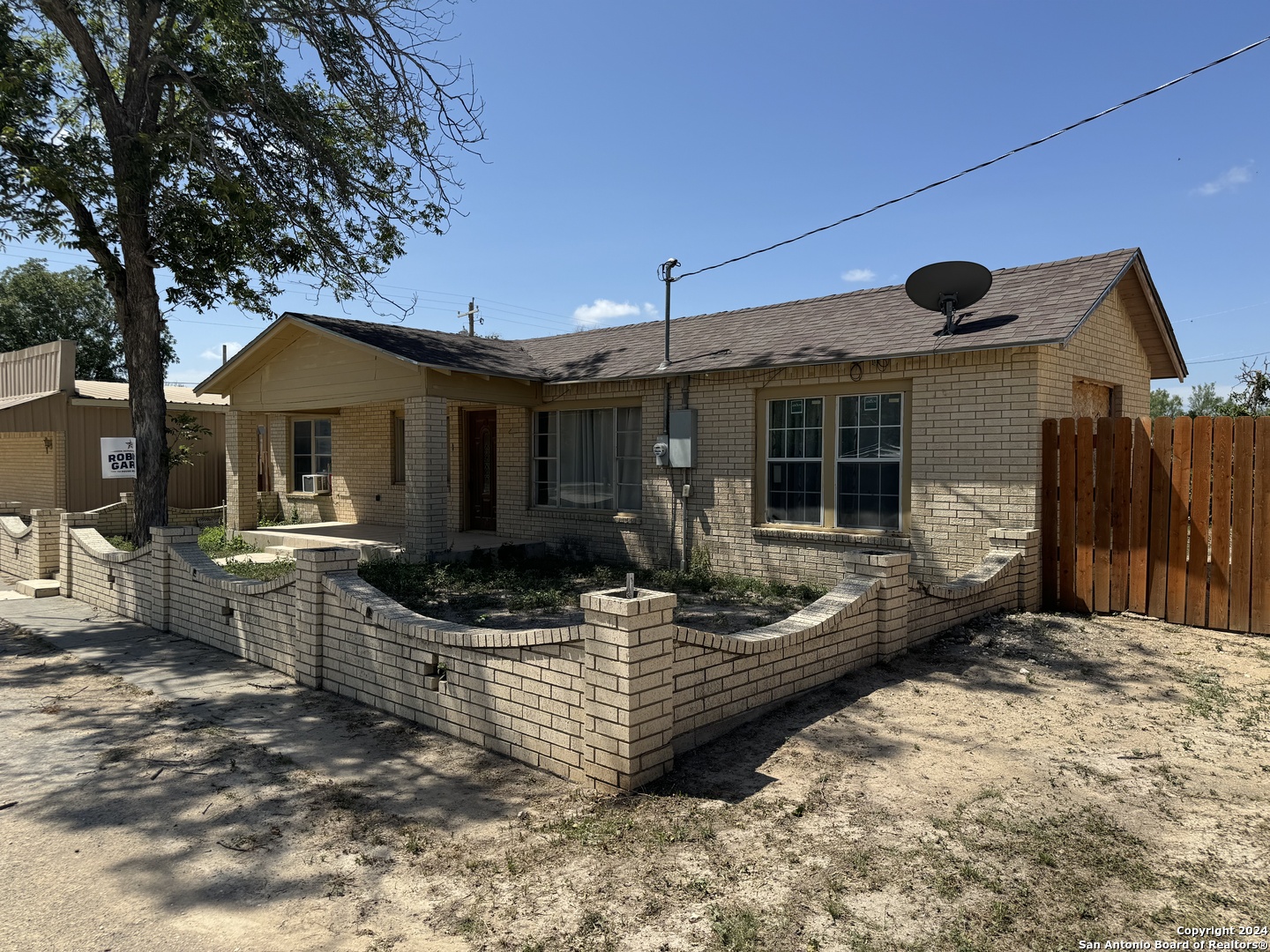 a front view of house with garage