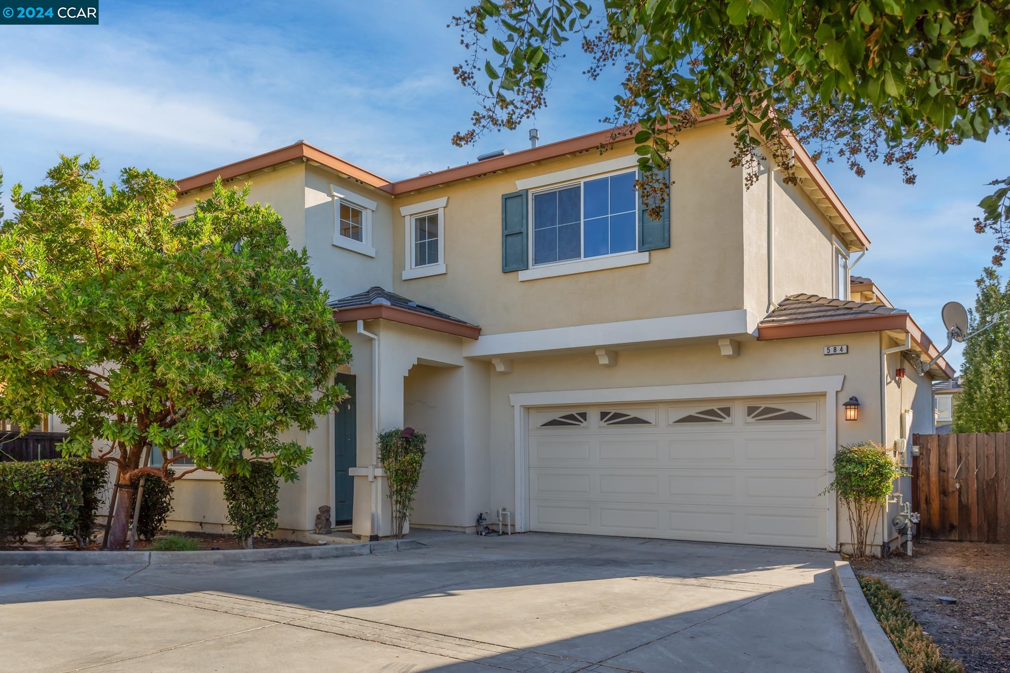 a view of a house with a garage