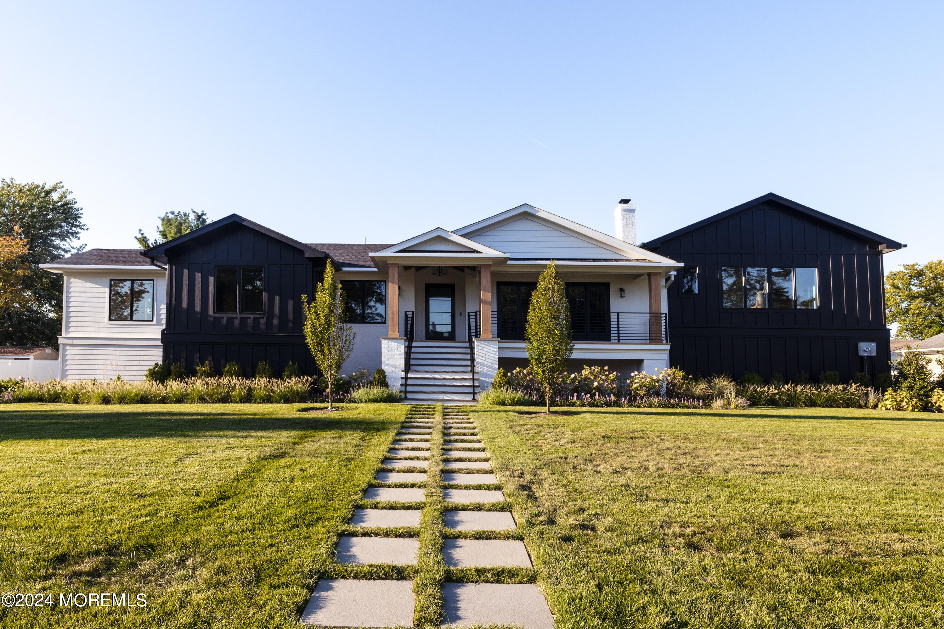 a front view of a house with swimming pool