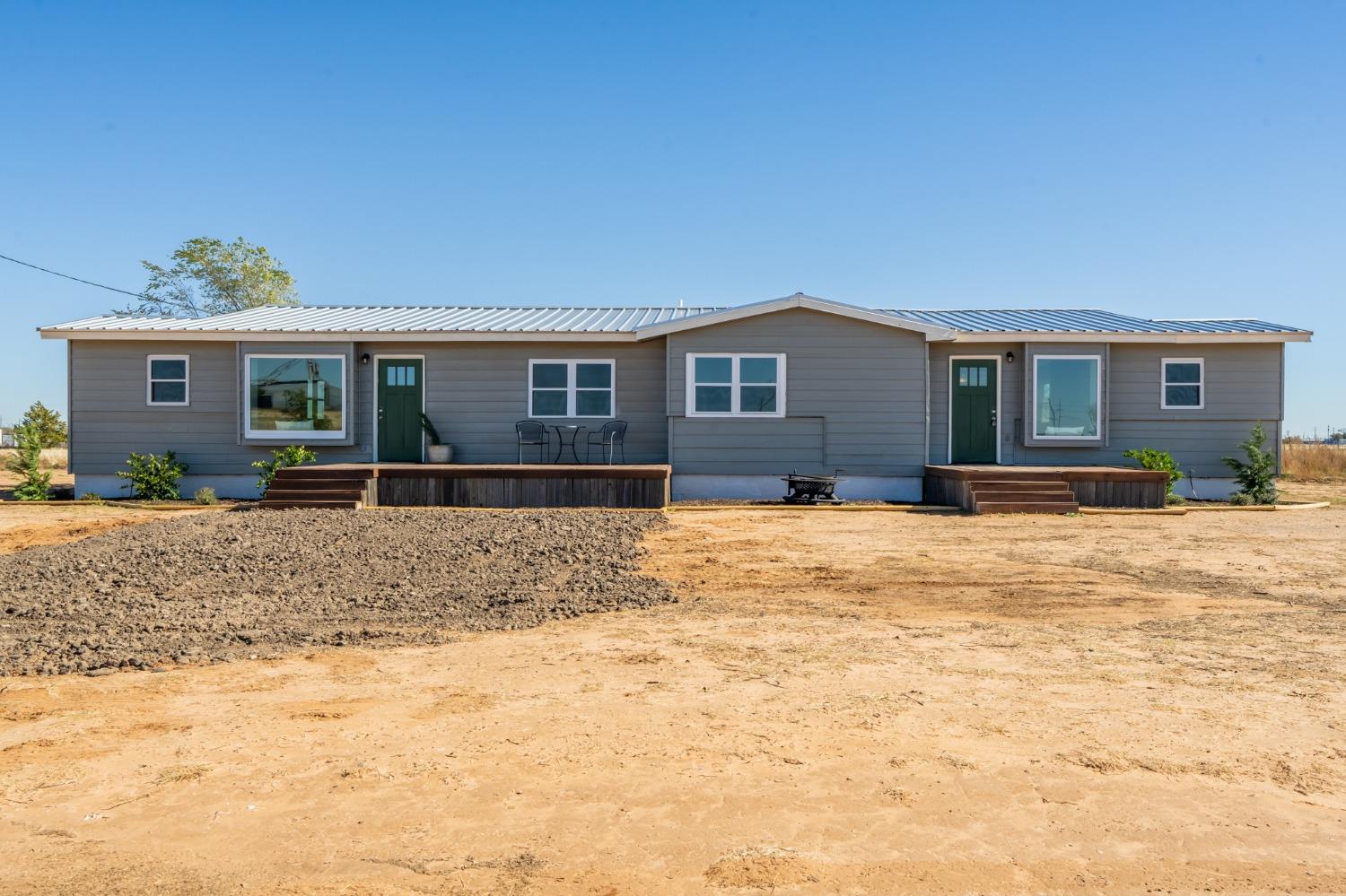 a front view of house with yard