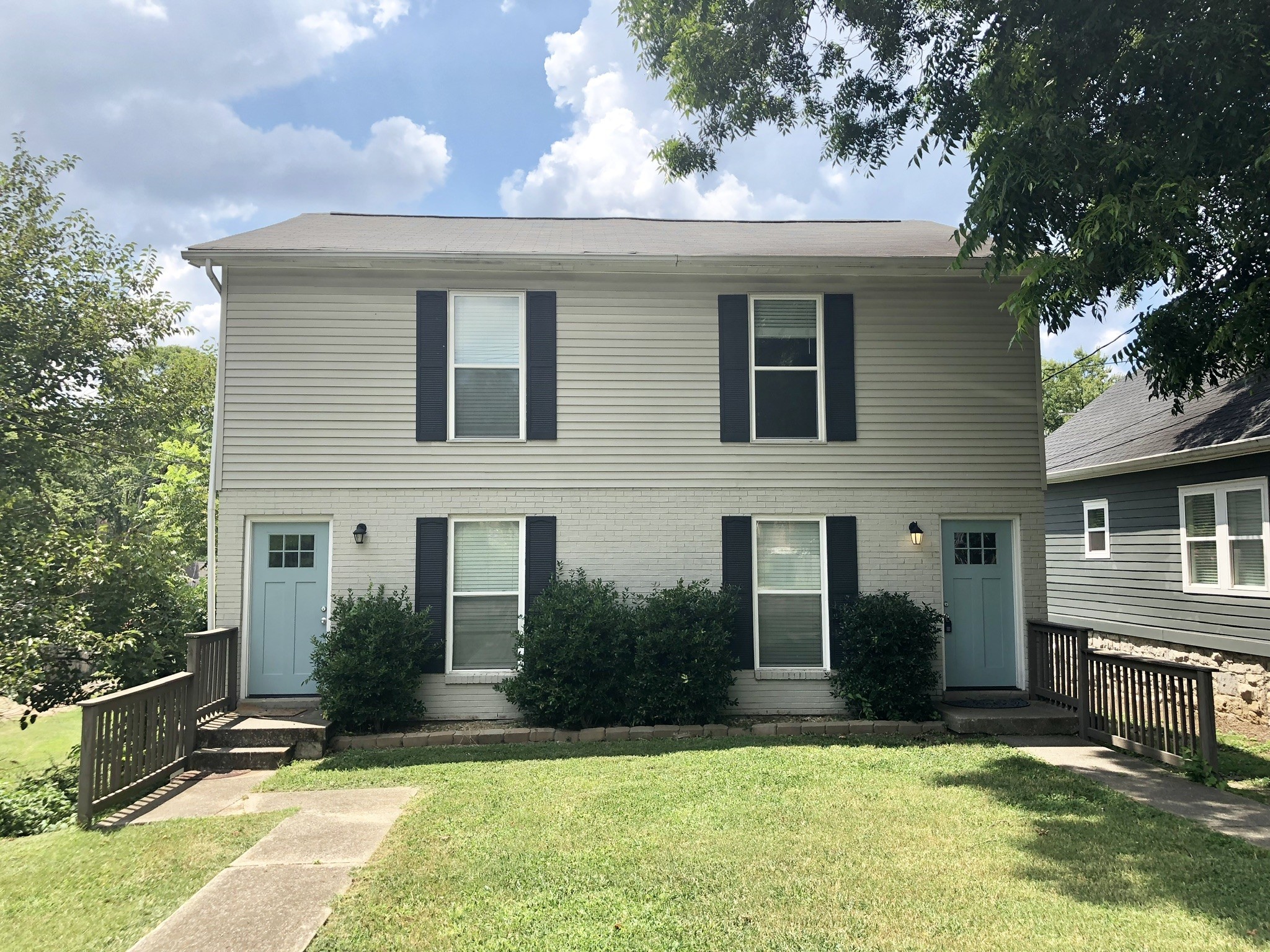 front view of house with a yard