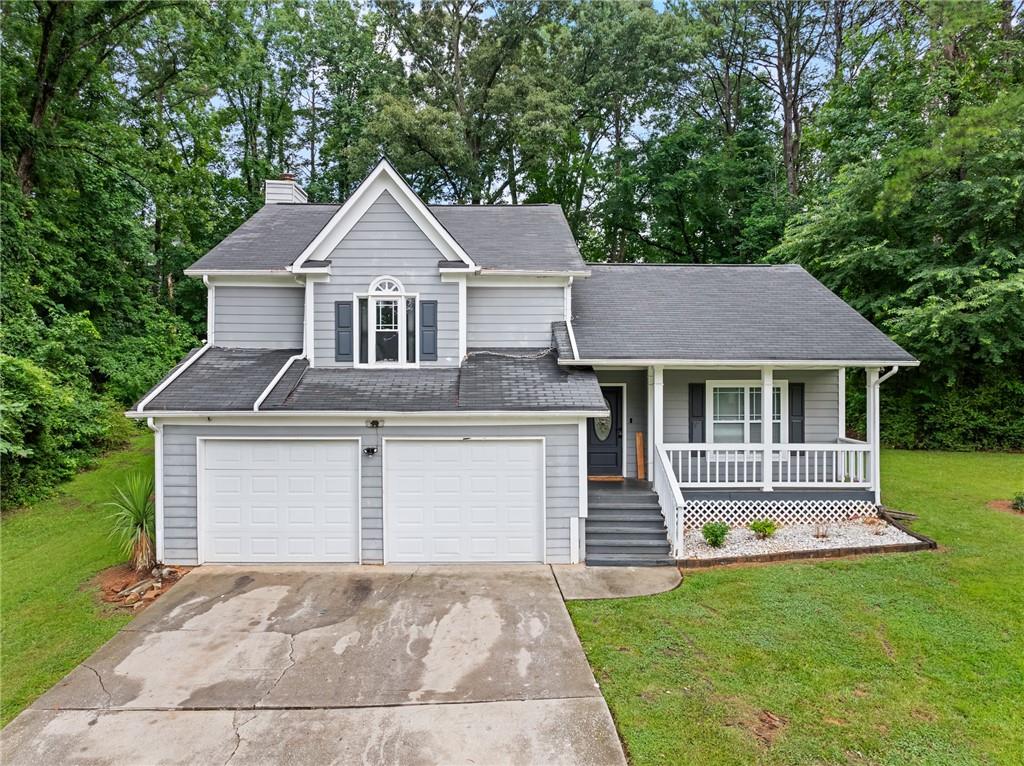 front view of a house with a yard