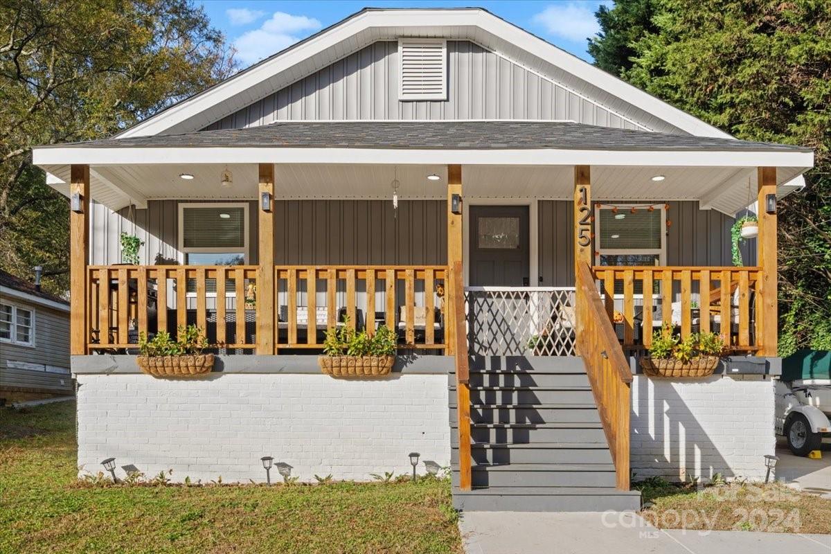 a front view of a house with garage