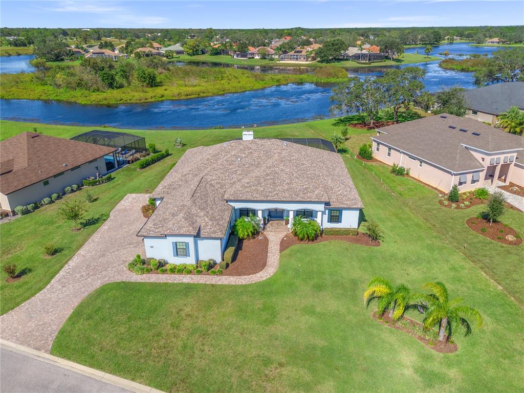 an aerial view of a house with garden