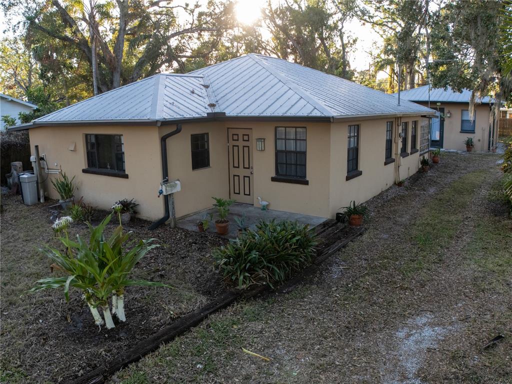 a view of a house with a garden