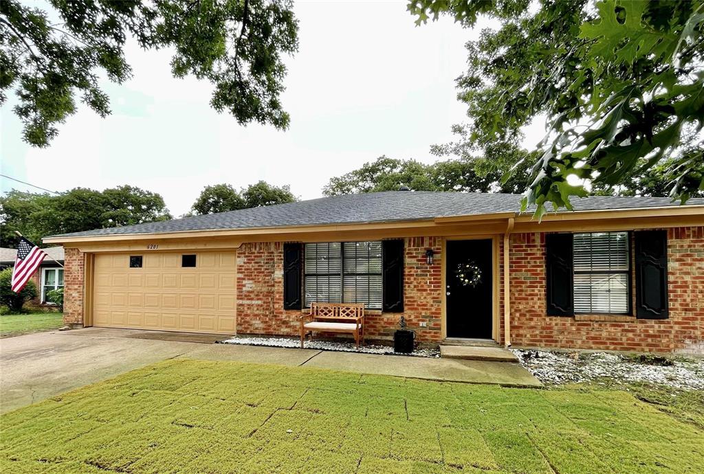 front view of a house with a patio