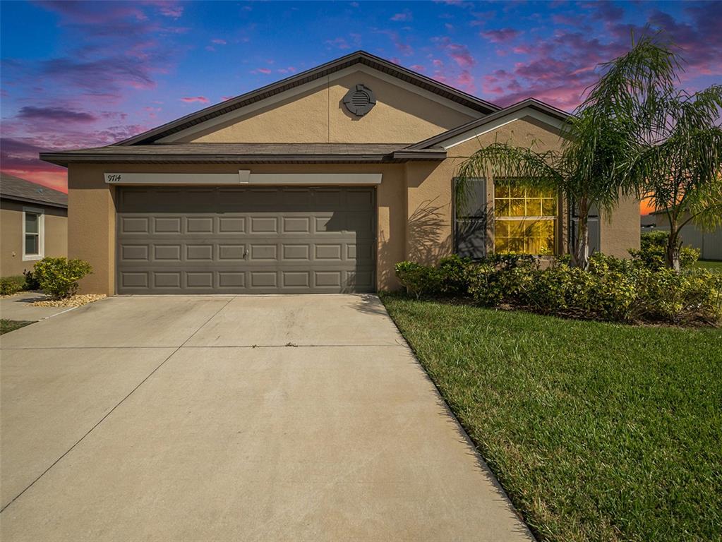 front view of a house with a yard