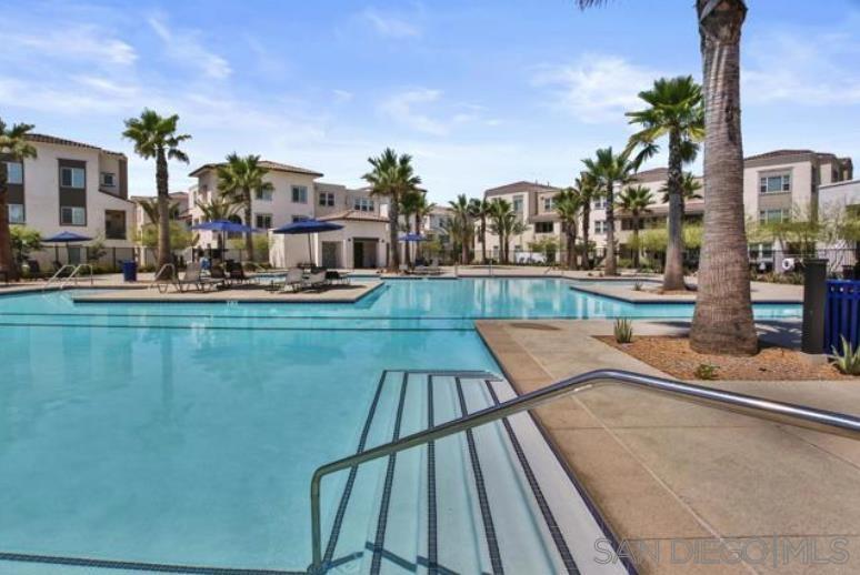 a view of a swimming pool with a patio