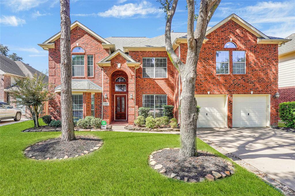 Stunning Stone Gate brick entrance home