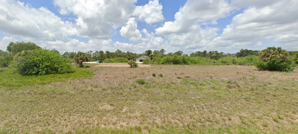 a view of an outdoor space and a yard