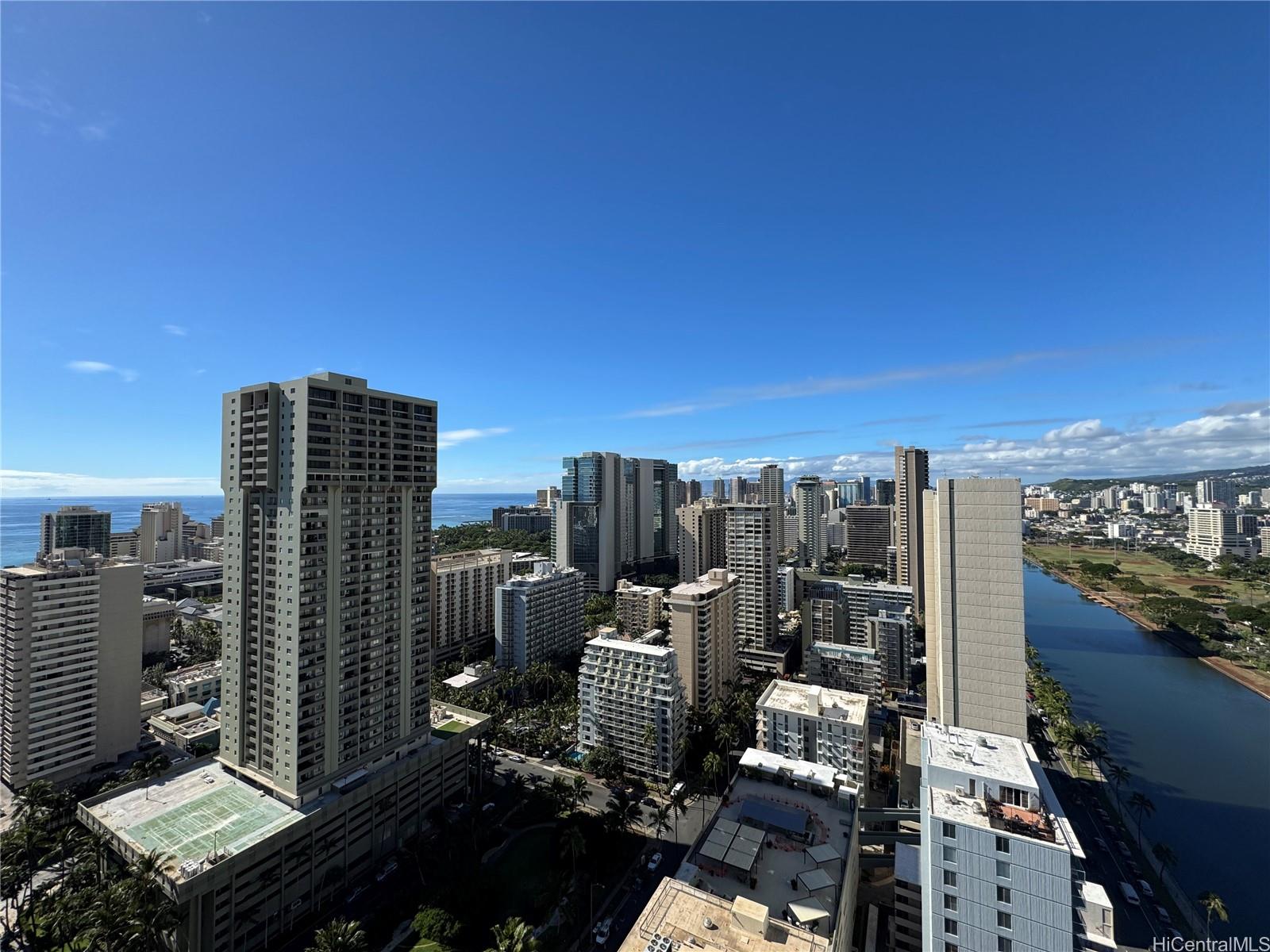 a view of a city with tall buildings