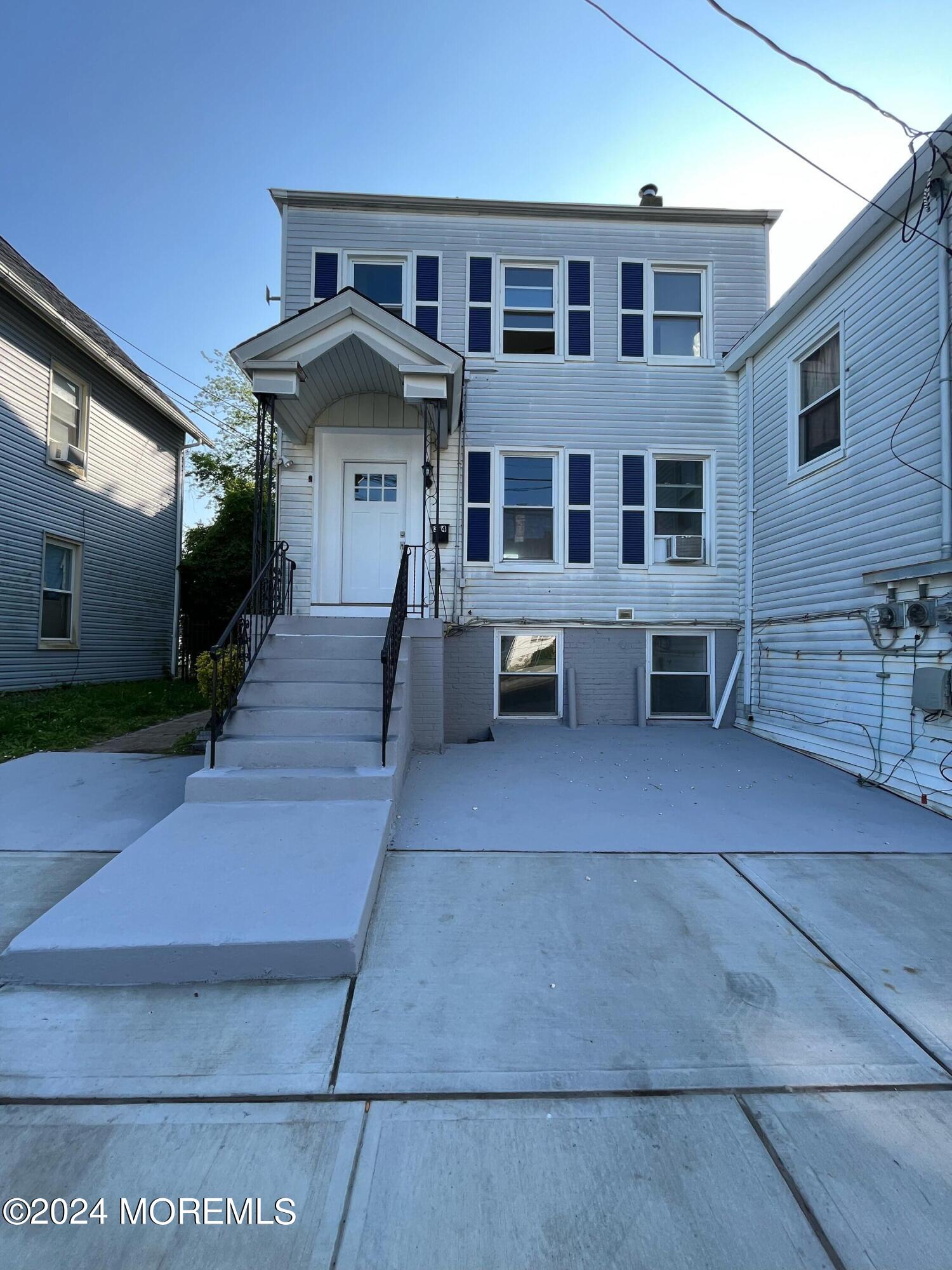 a view of a house with sitting area