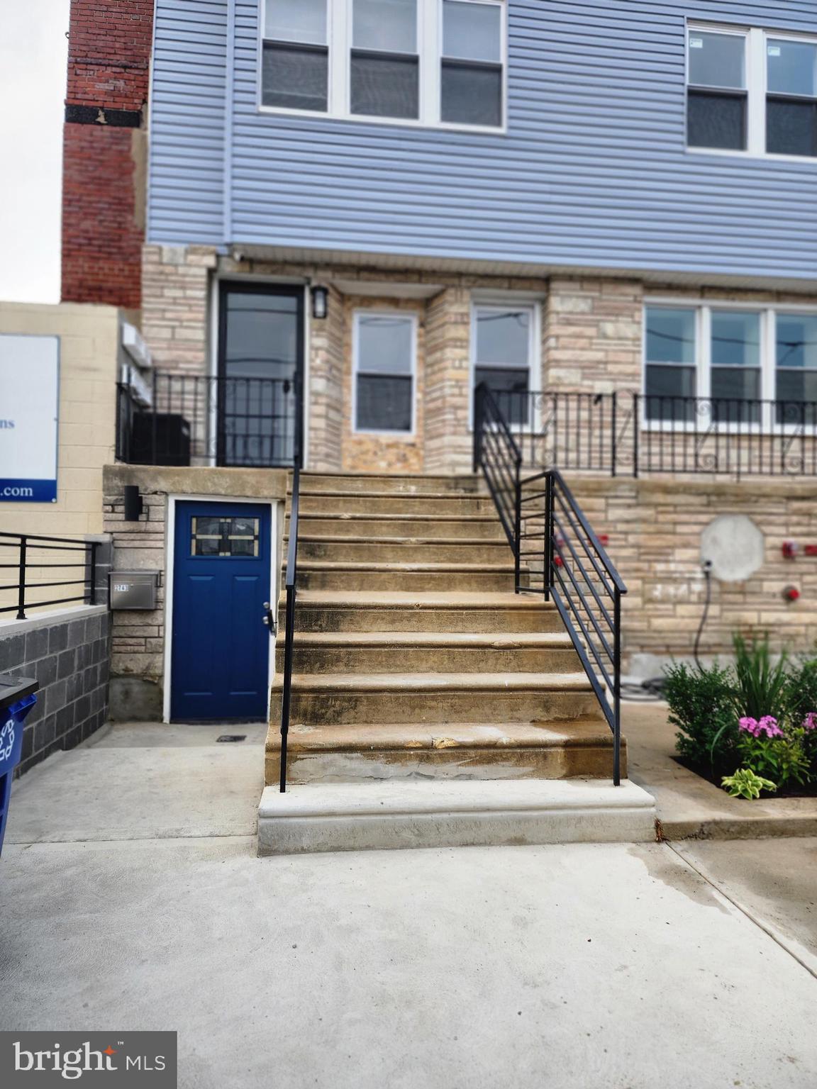 a view of a house with entryway and stairs