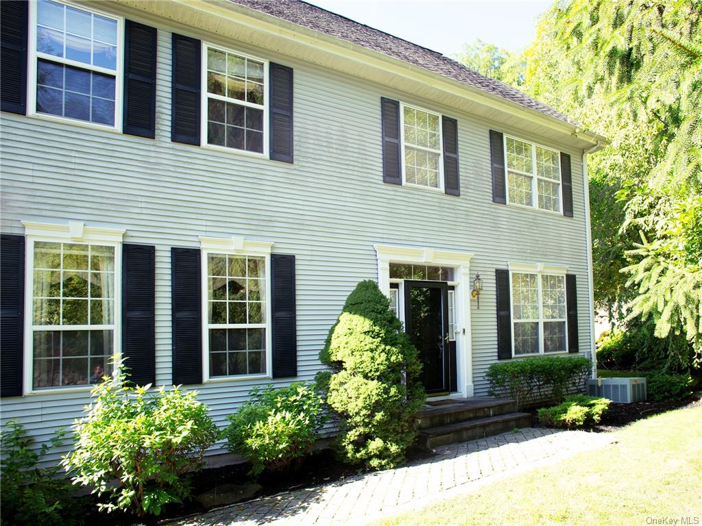 a house with a large garden view