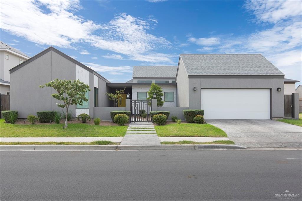 a house view with a garden space