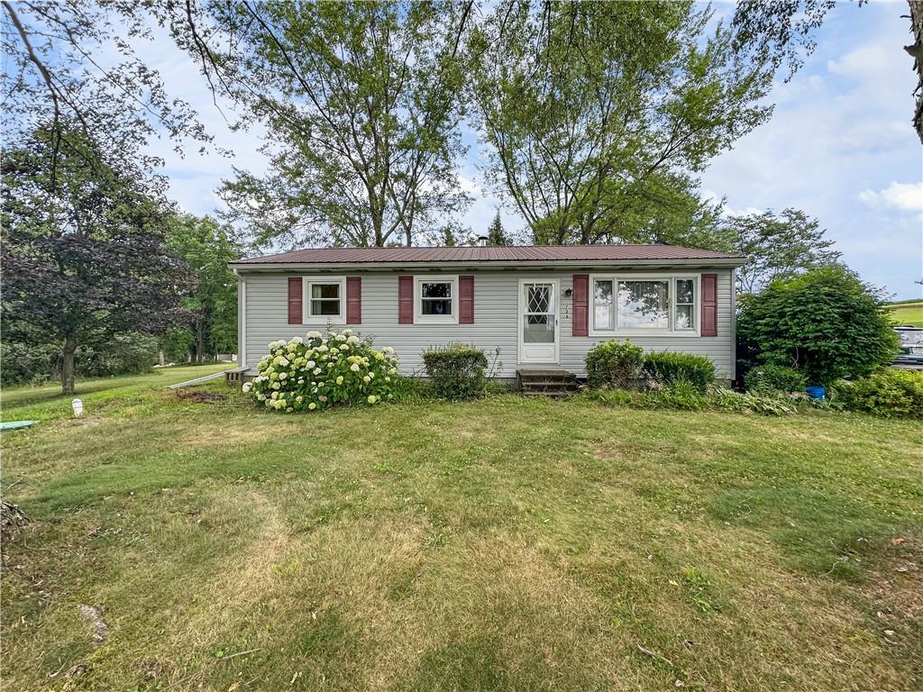 front view of house with a yard