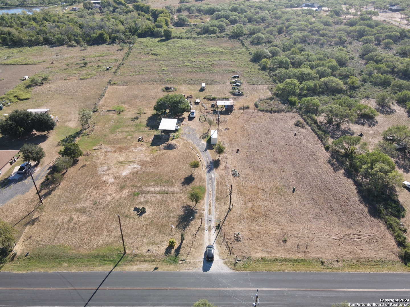 a view of a road with a yard