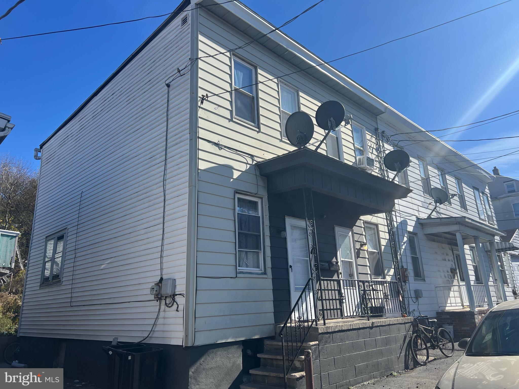 a view of a house with a garage