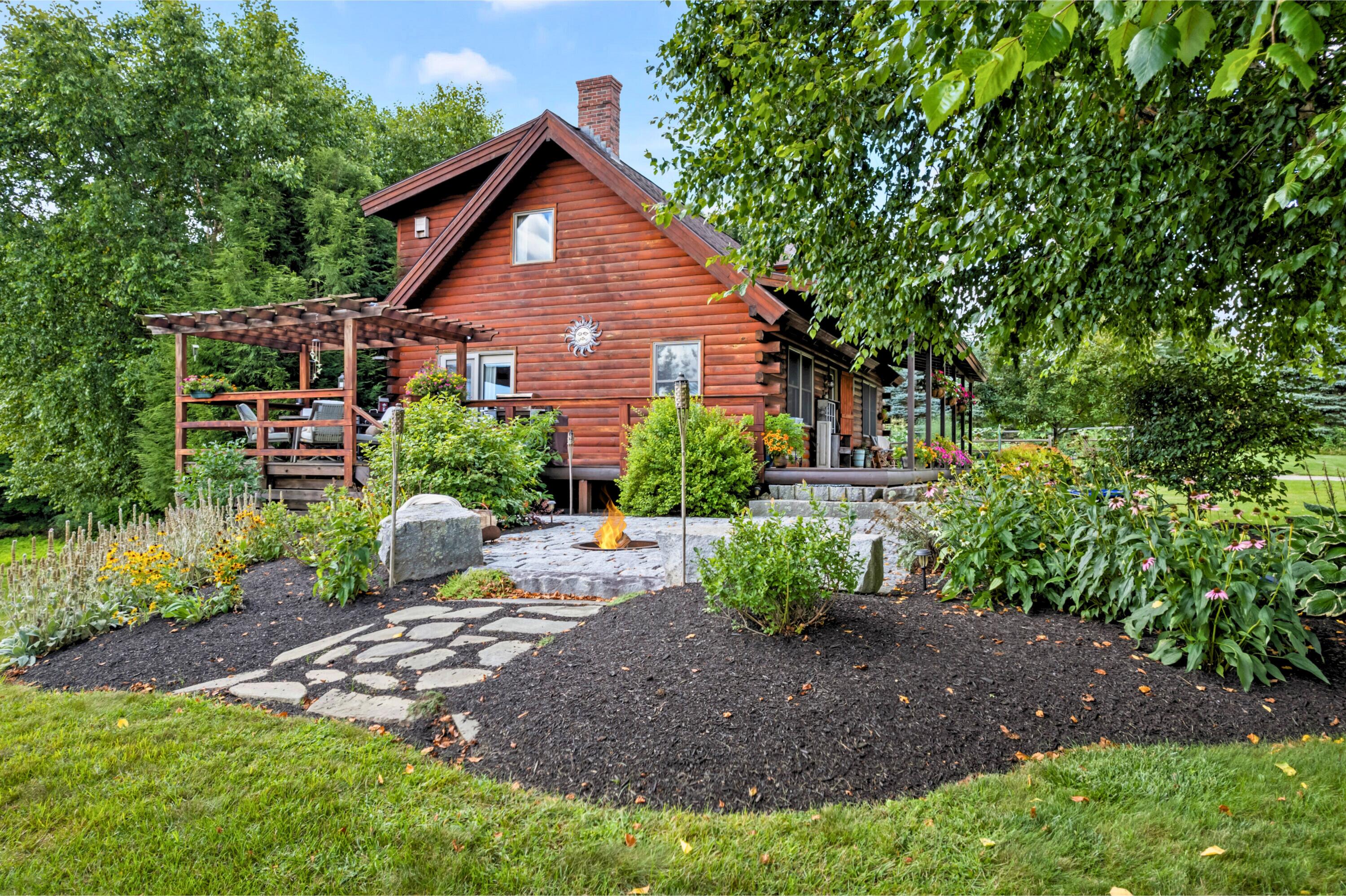 Patio and log cabin side