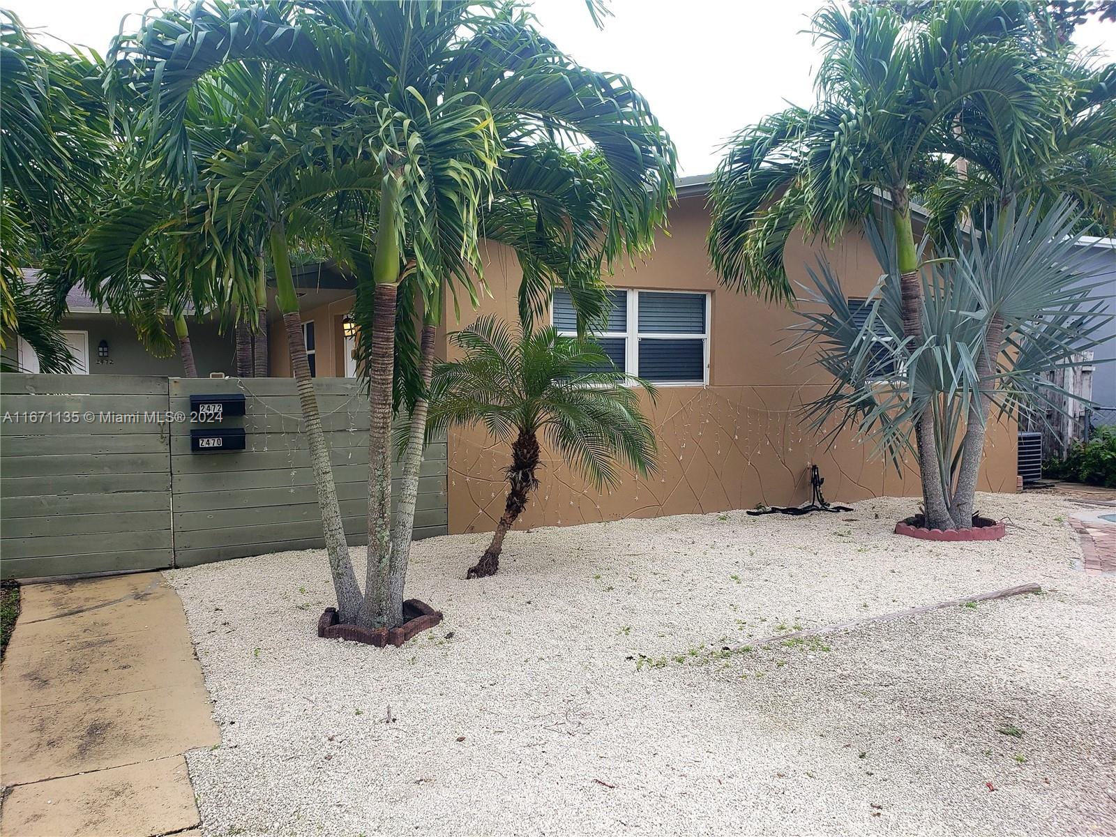 a view of a backyard of a house