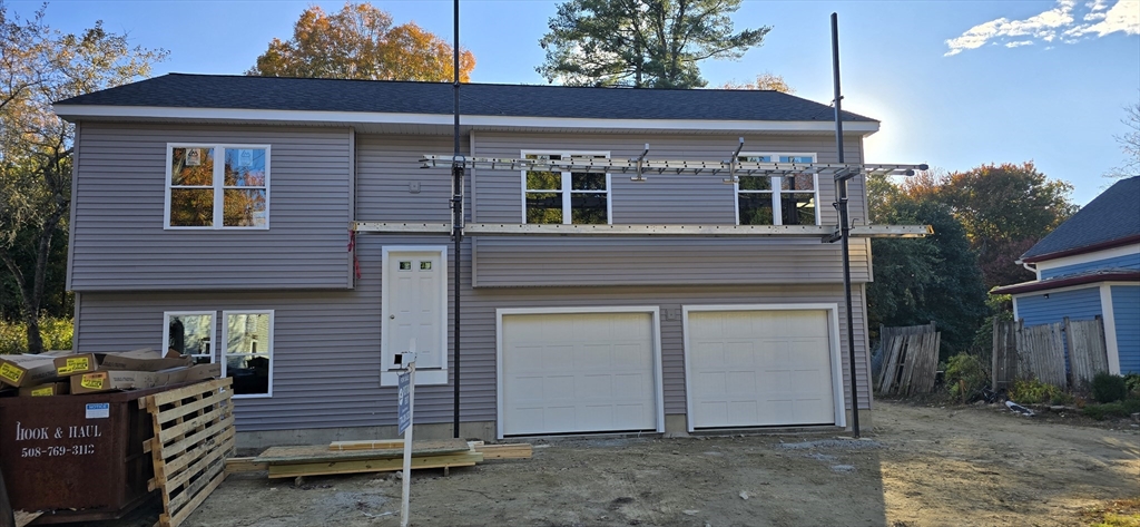 a view of a house with garage