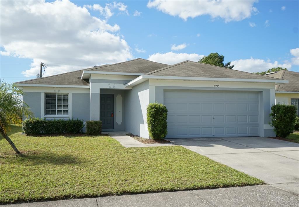 front view of a house with a yard