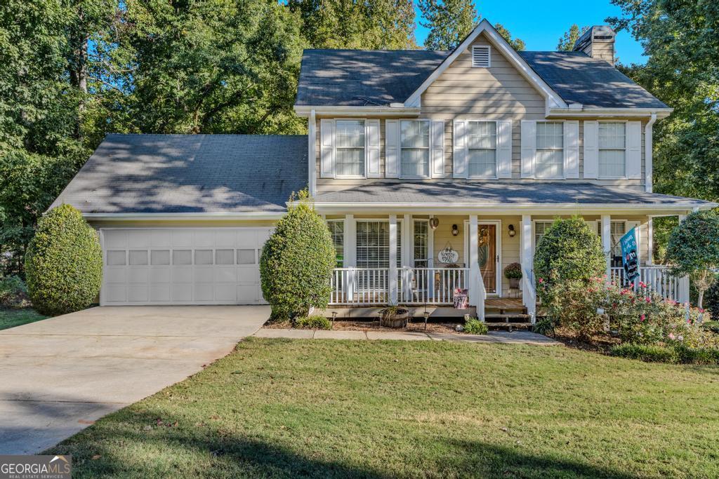 front view of a house with a yard