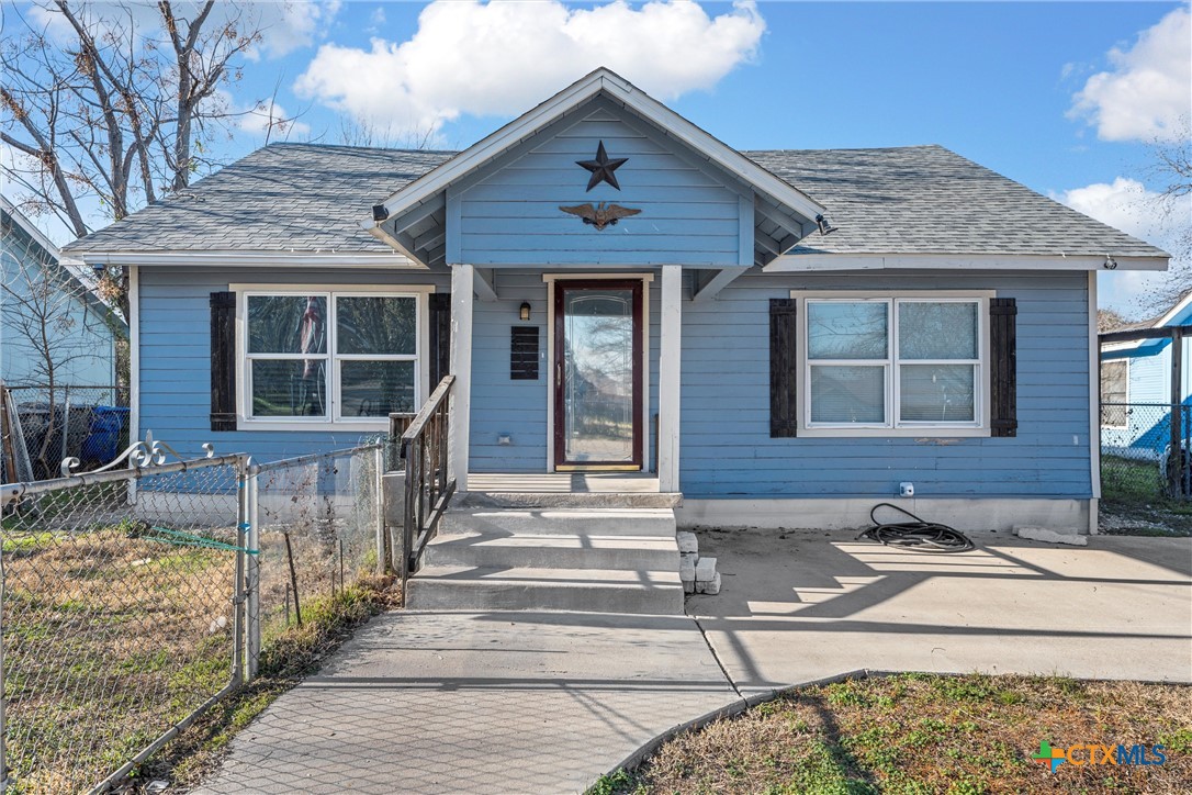 a front view of a house with a porch