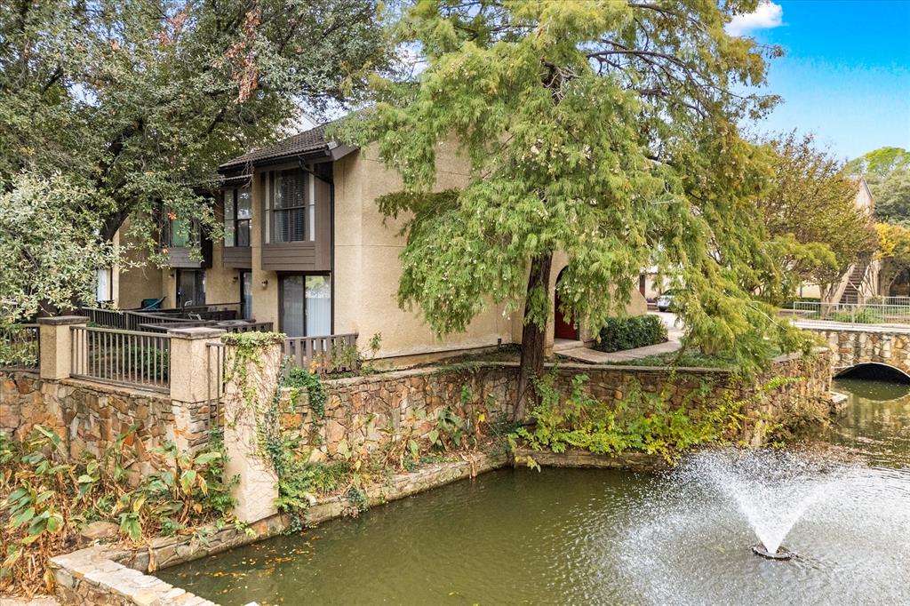 a front view of a house with swimming pool