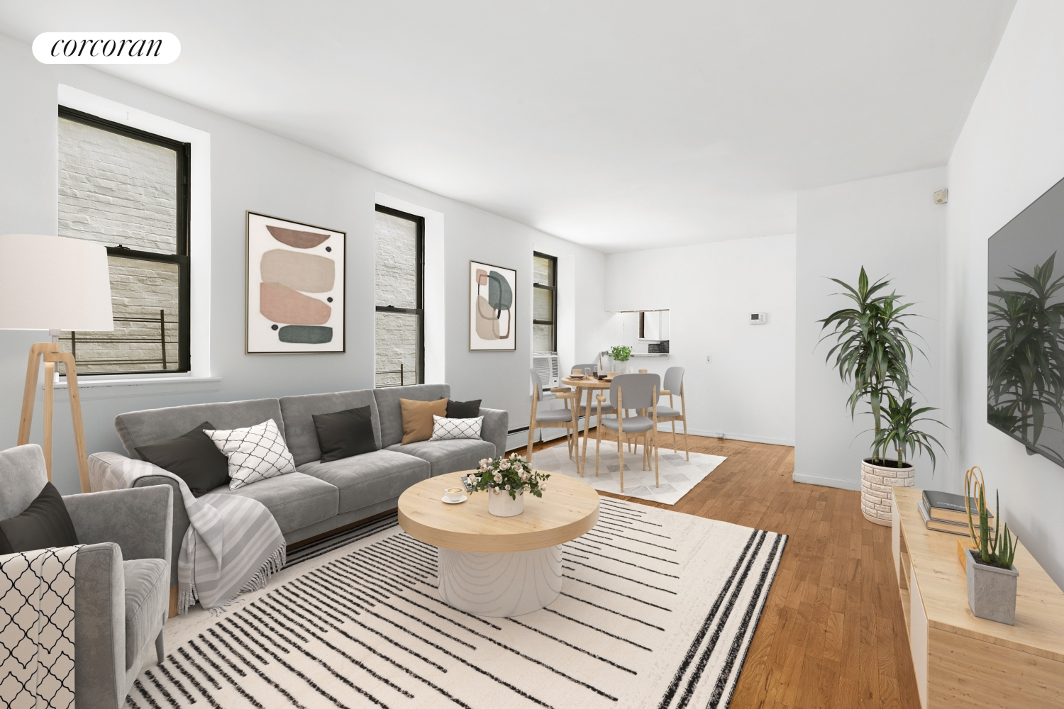 a living room with furniture and a rug