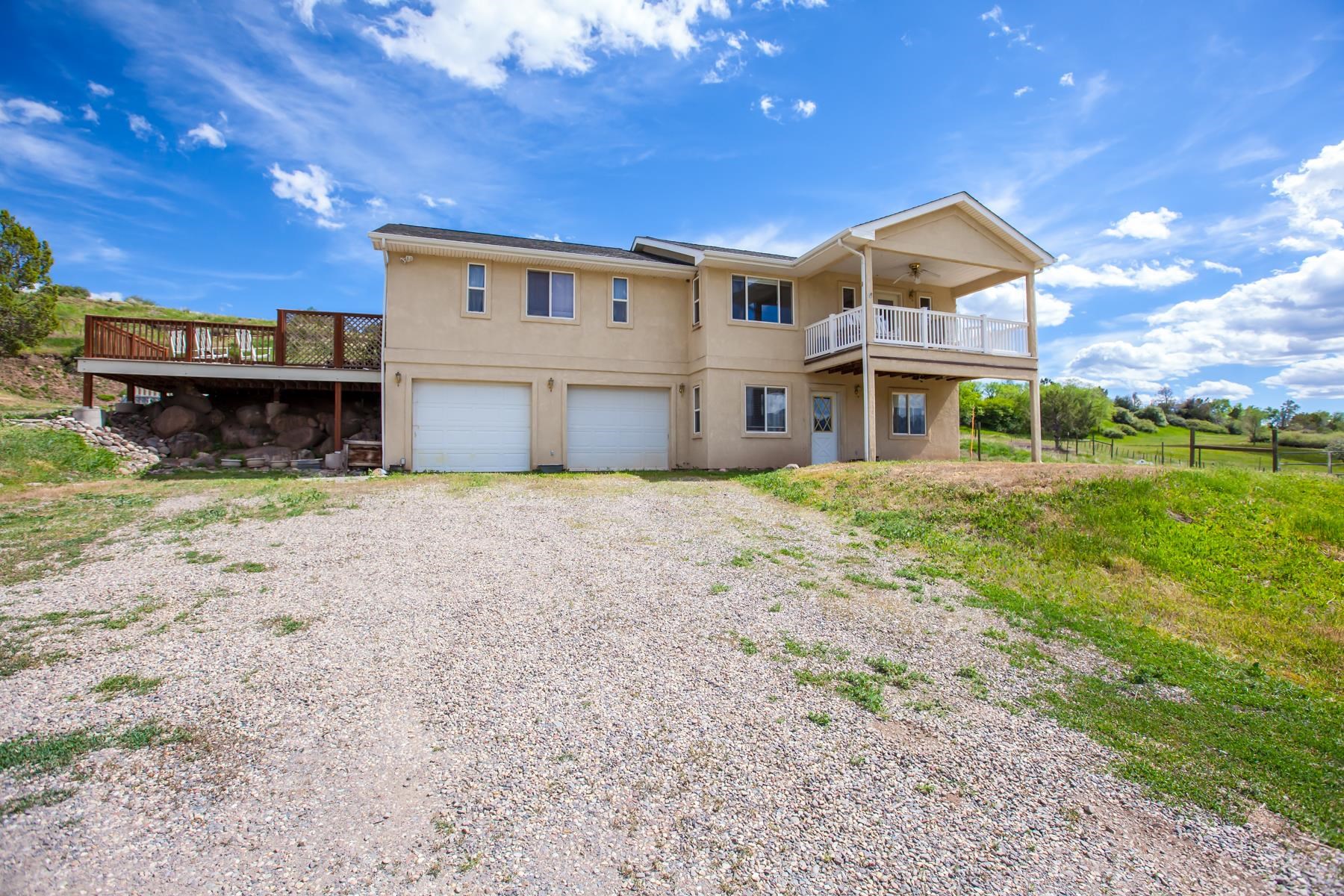 a view of a house with a big yard