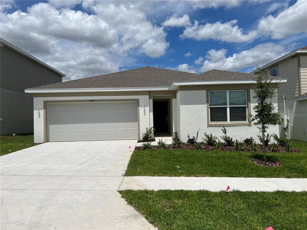 front view of house with a yard