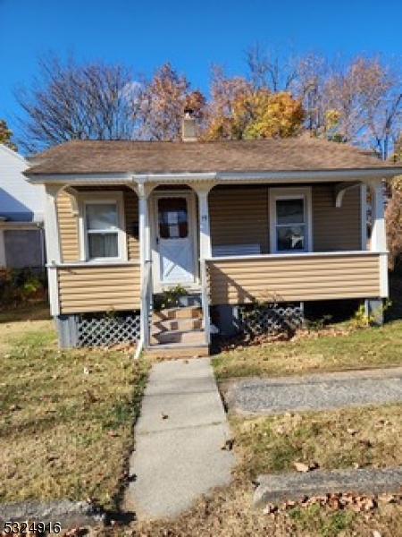 a front view of a house with a garage