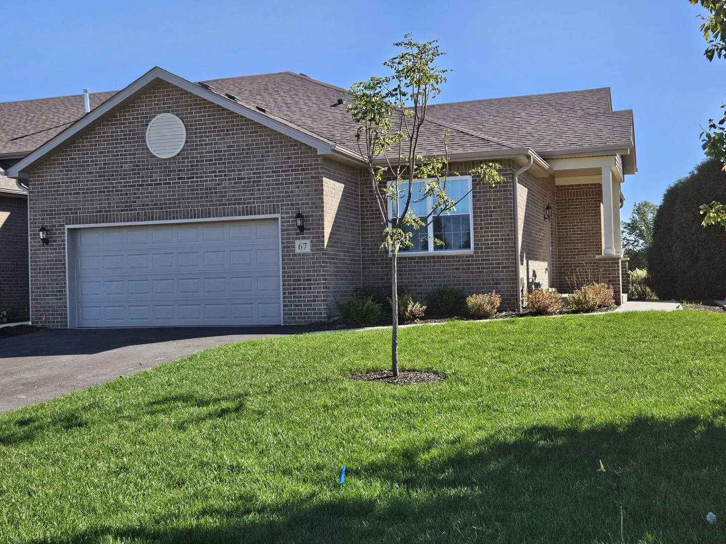 a house view with a garden space