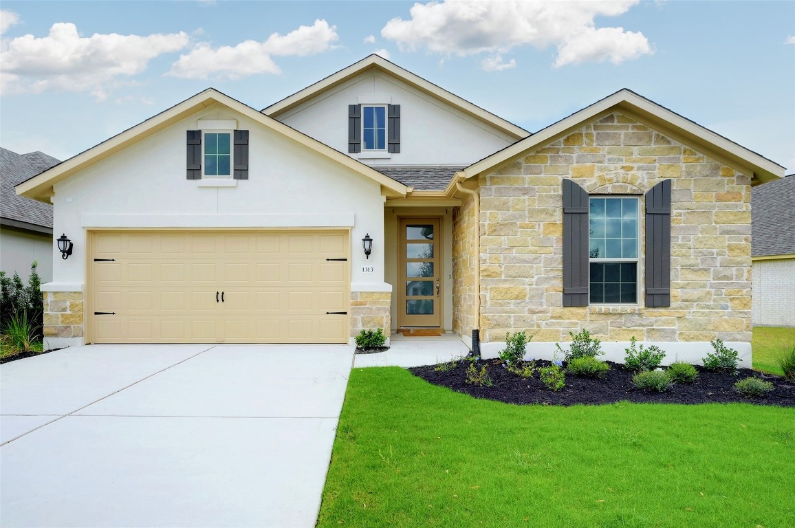 a front view of house with yard