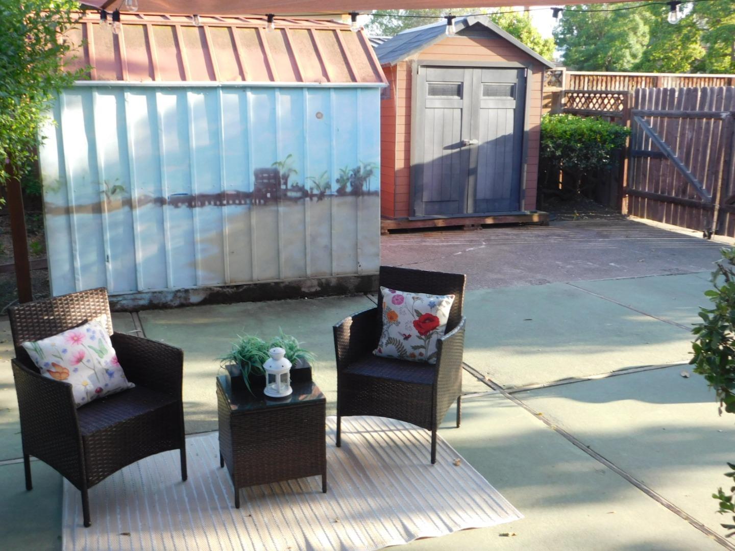 a view of a porch with furniture