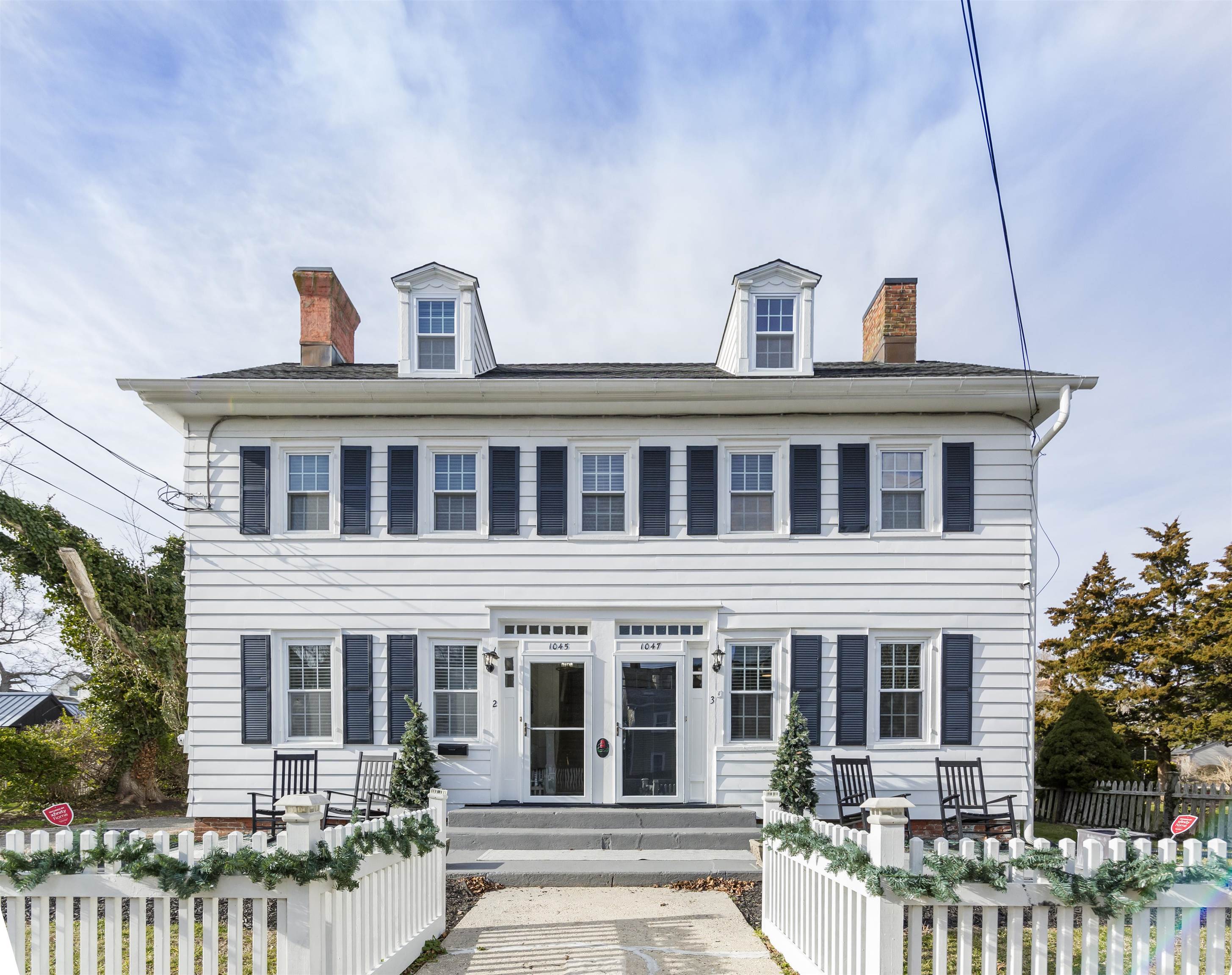 a front view of a house with a porch