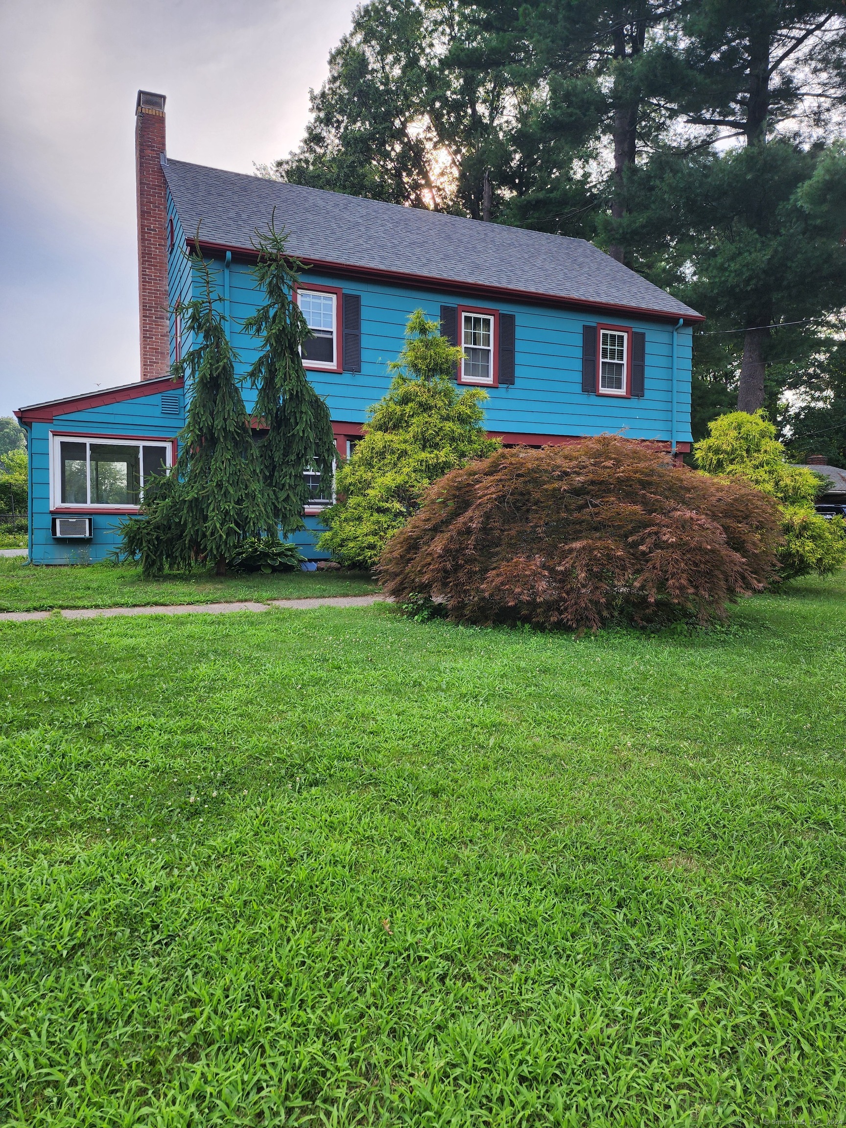 a house view with a garden space