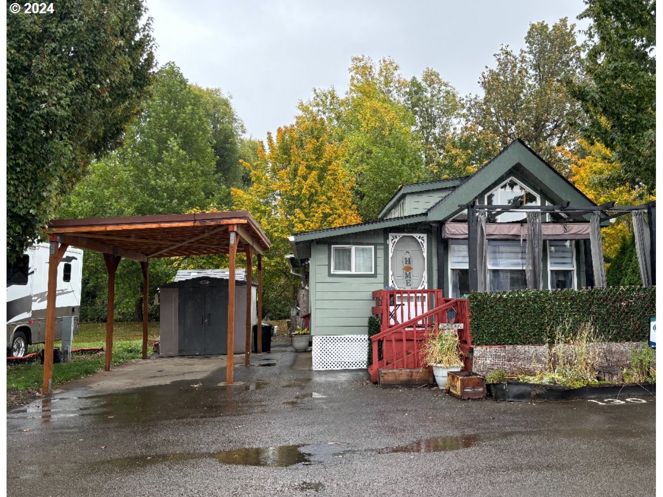 a front view of a house with garage