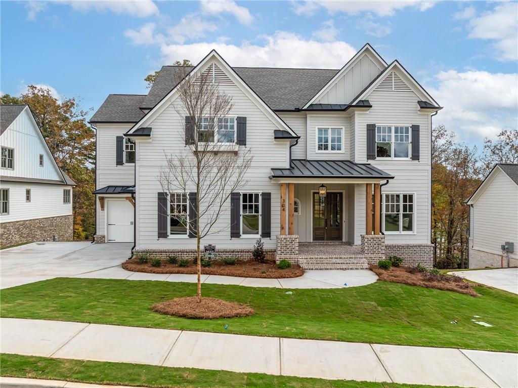 a front view of a house with a yard