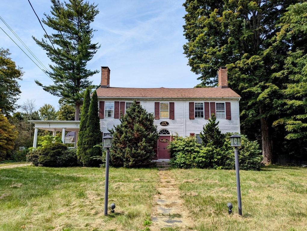 a house view with a garden space