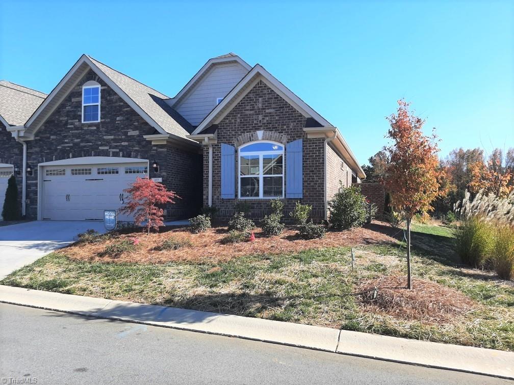 Beautiful stone/brick exterior on this home.  Another completed home of this floorplan pictured.  Actual home still under construction.