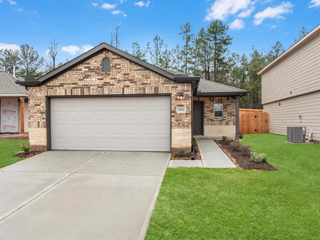 front view of house with a yard