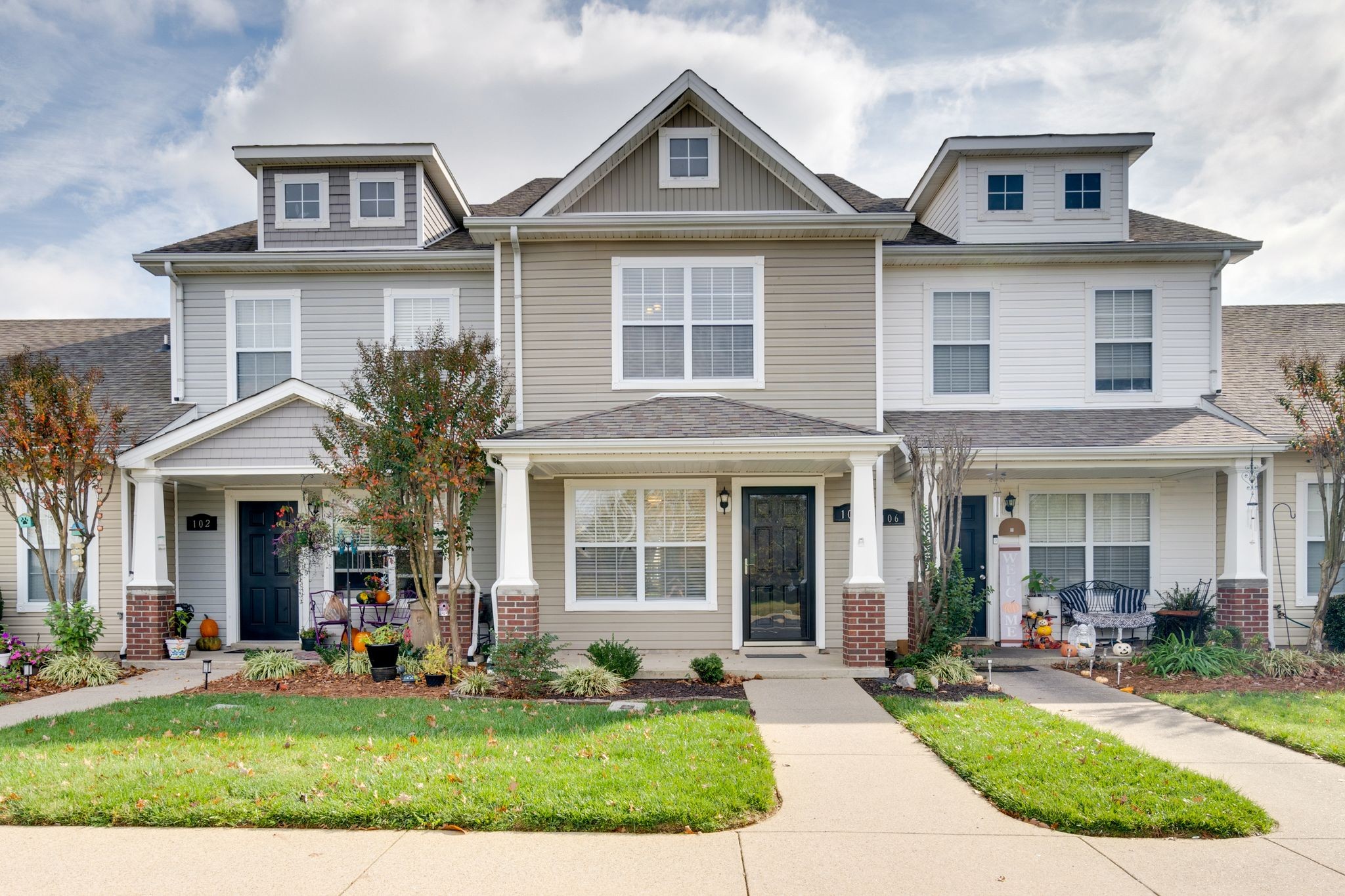 front view of a house with a yard