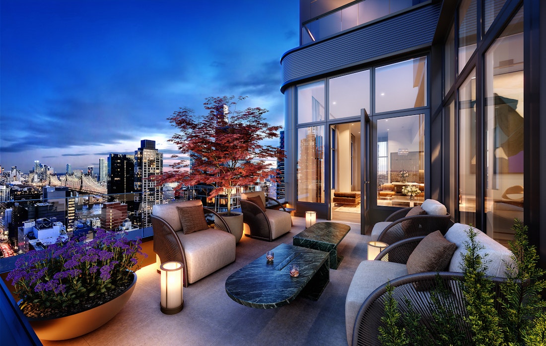 a living room with furniture and a floor to ceiling window