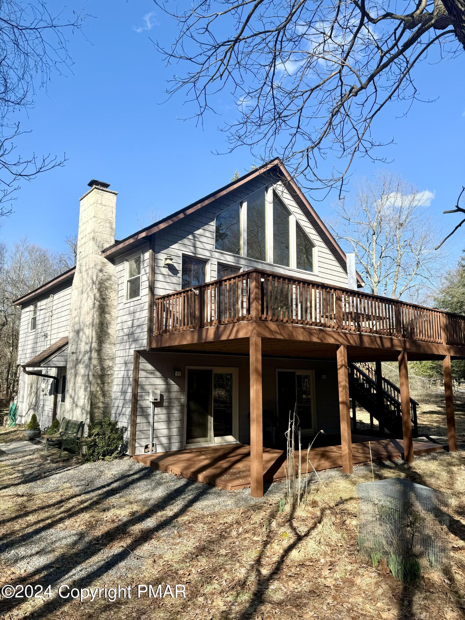 a front view of a house with a porch